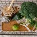 A basket of fresh produce and oats promoting a healthy and sustainable lifestyle.